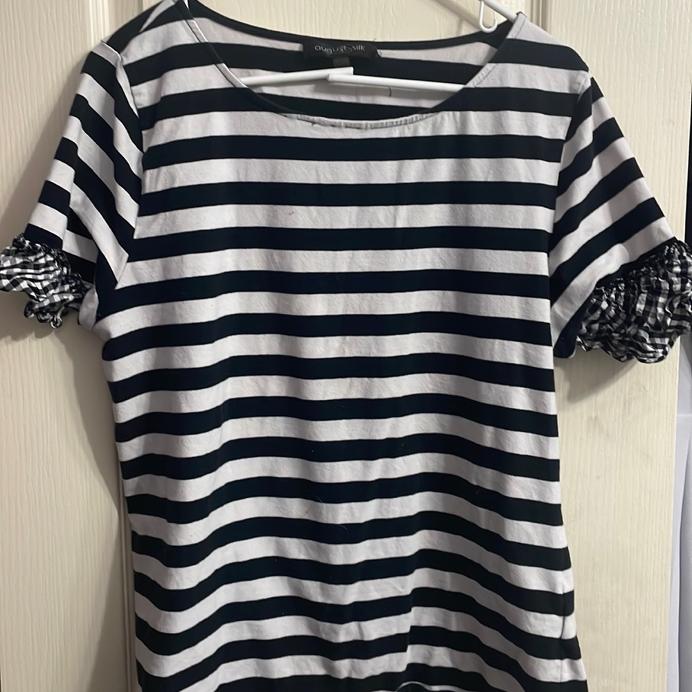 Black and white blouse with cute ruffles around arm band:)